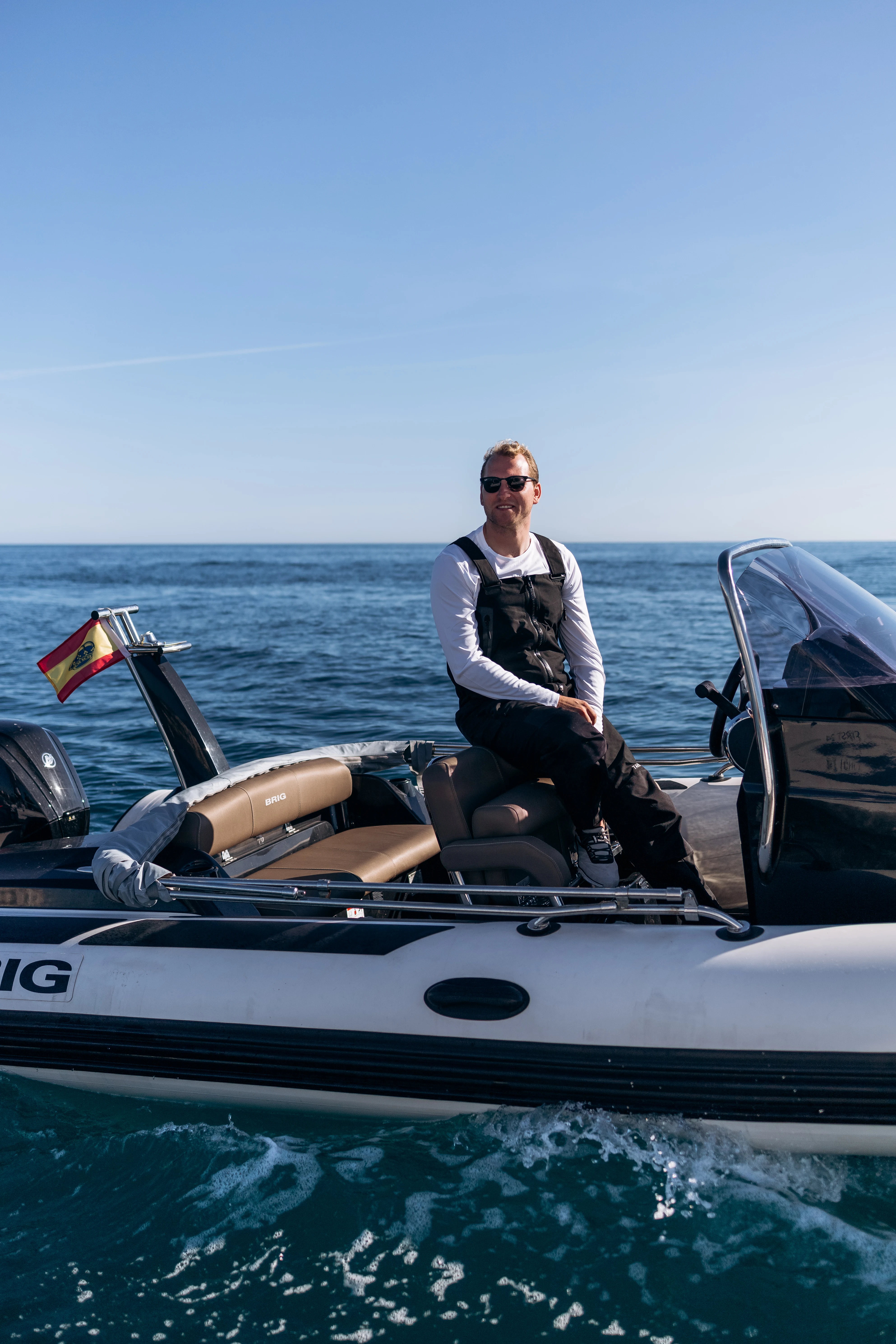 Denis Kotlyarov on a RIB at sea.
