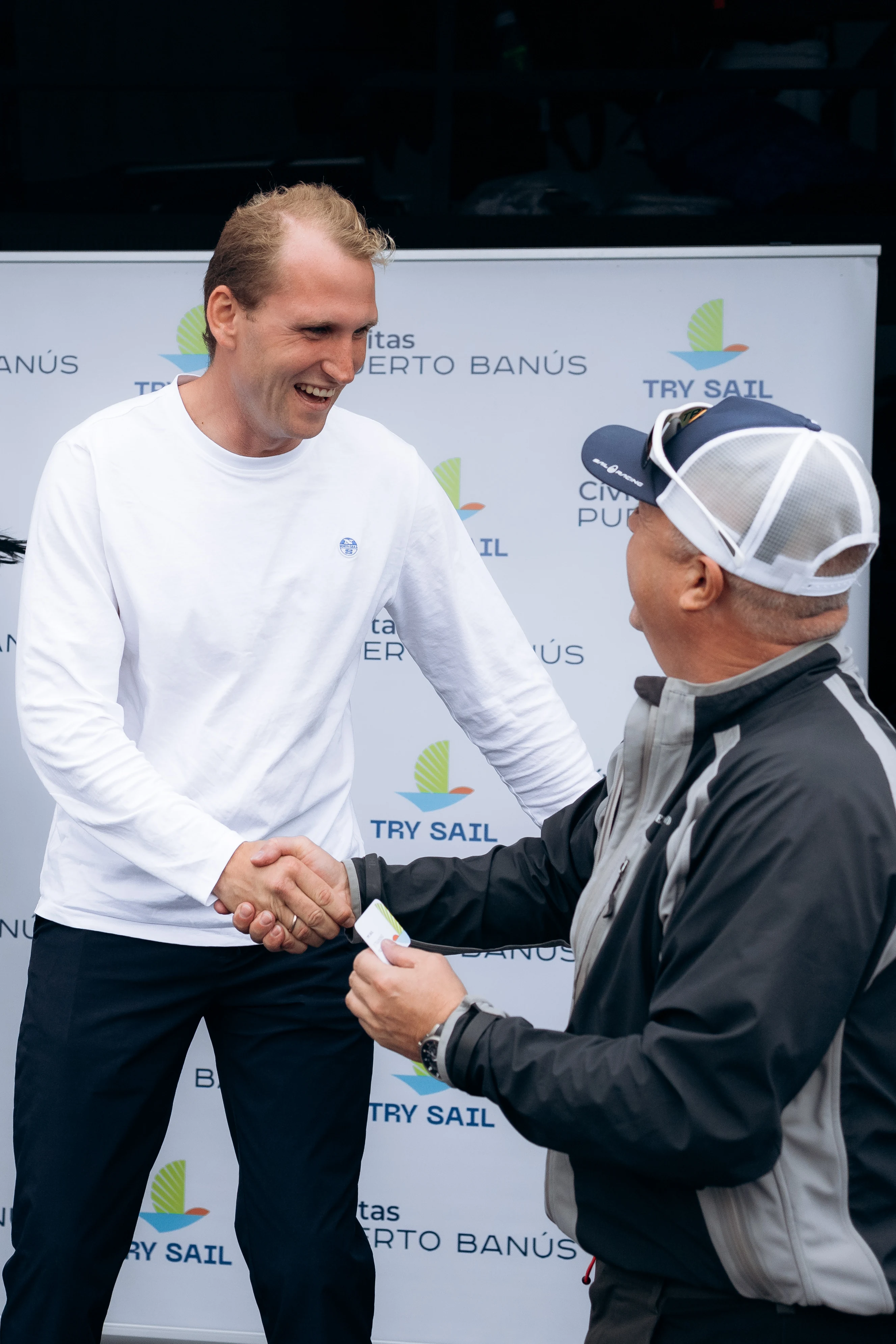 Client regatta moment showing Denis Kotlyarov's yachting experience services.